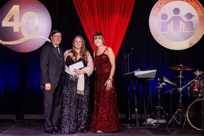 “Kathleen Mulvaney (center) receives a CCF Research Award at the 40th Annual CCF Gala on November 2, 2024. Presenting the award are CCF Board Chairman Dr. Jerrold Chadwick (L), and CCF President Tasha Museles (R).”